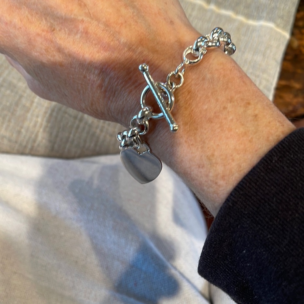 Sterling Rolo style bracelet with Sterling heart charm.
